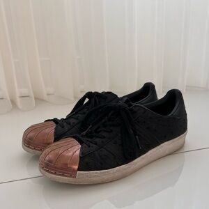 Woman’s Adidas black leather sneaker size 6.5